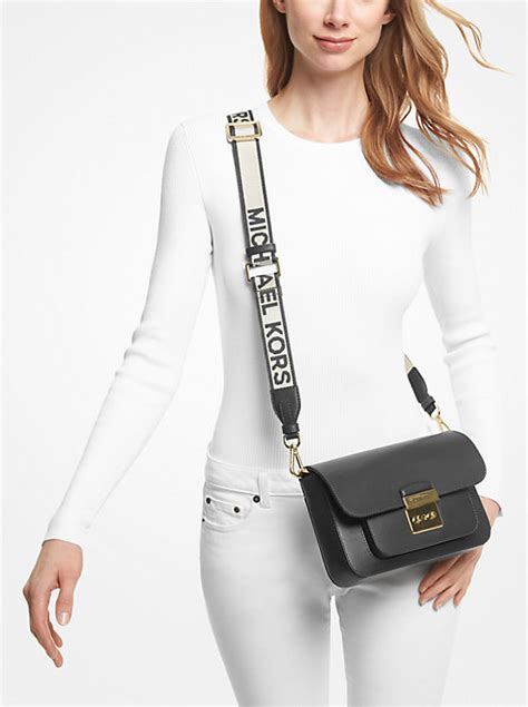 sloan editor leather messenger michael kors|Sloan Editor Medium Signature Logo Messenger Bag .